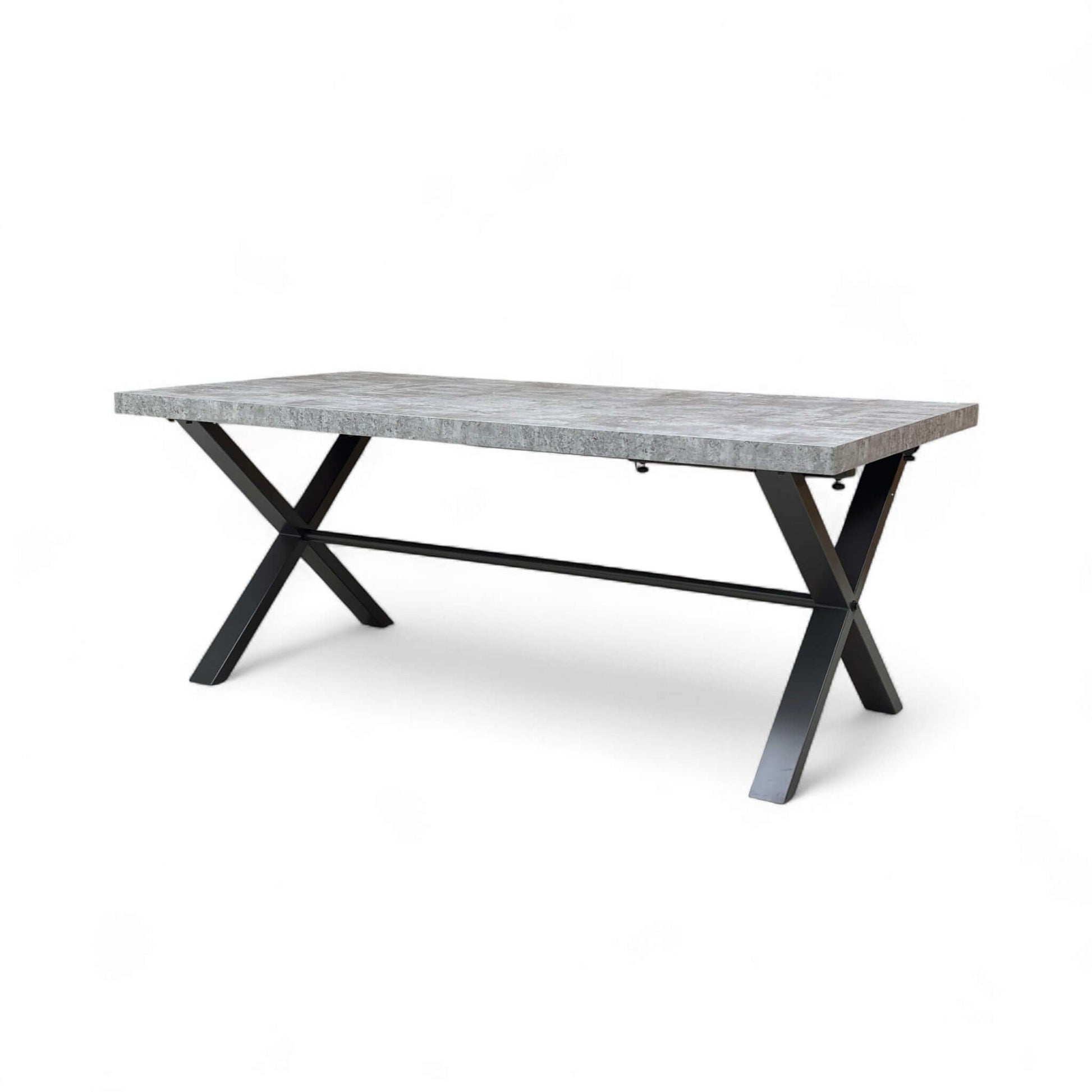Rectangular dining table with concrete top and black metal legs on a white background