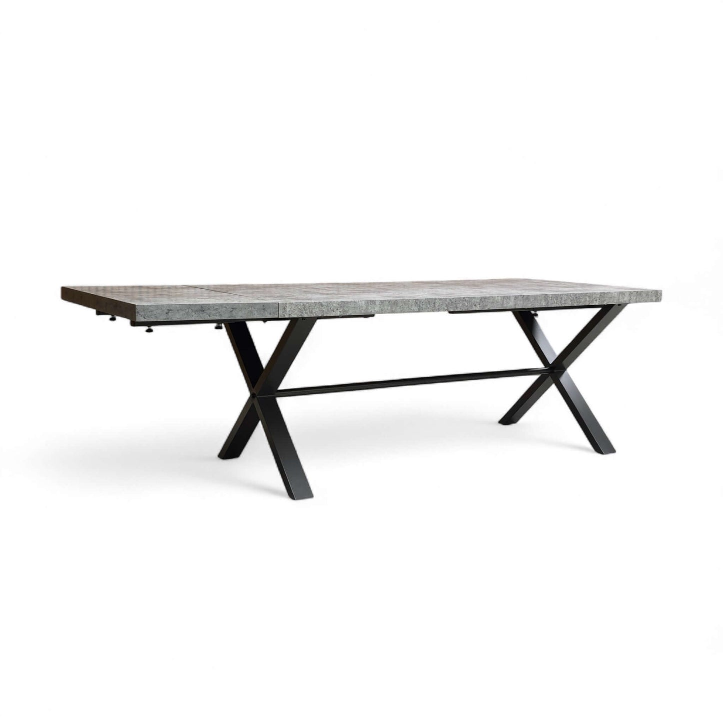 Dining table with concrete top and black metal legs on a white background