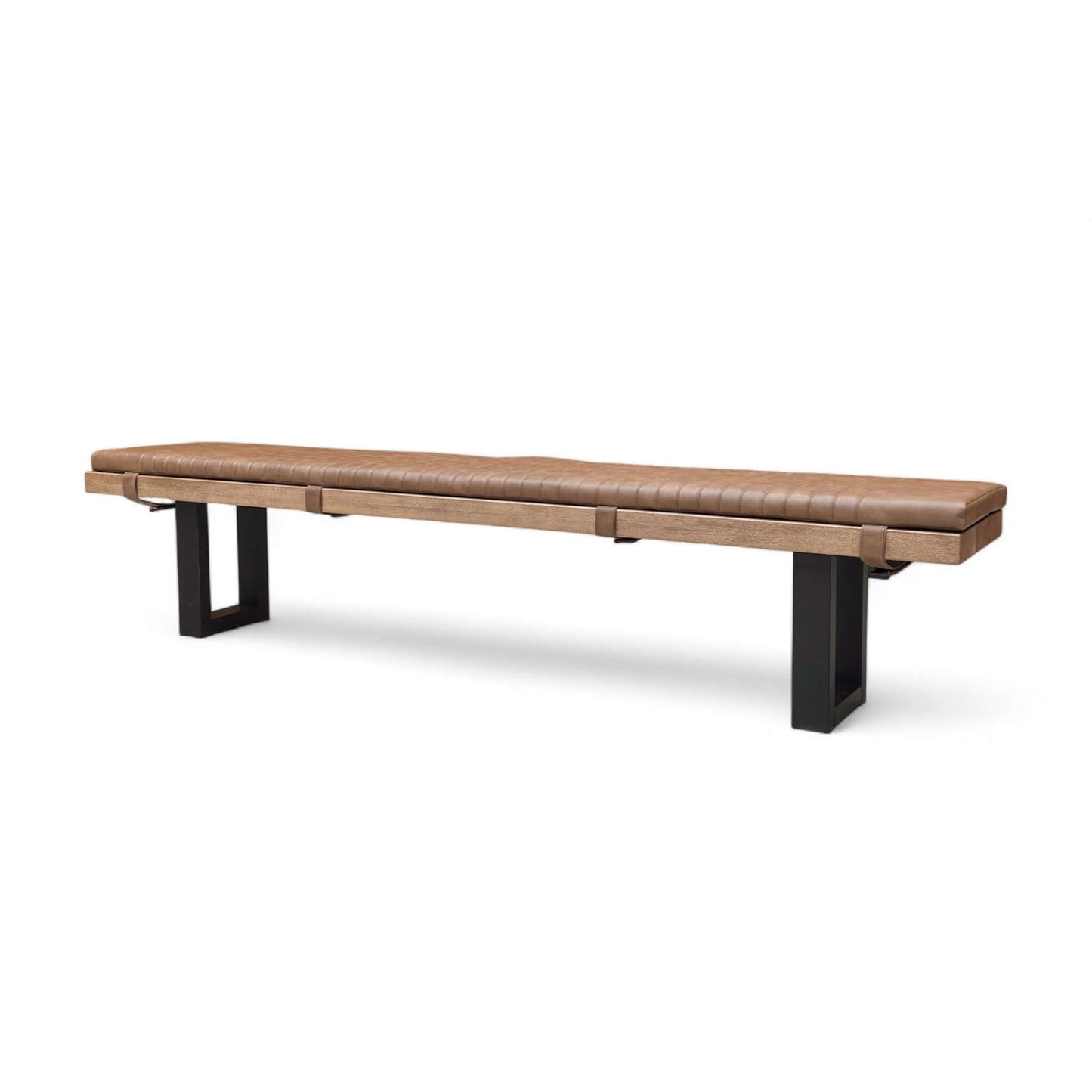 Long bench with brown leather seat and black metal legs on a white background