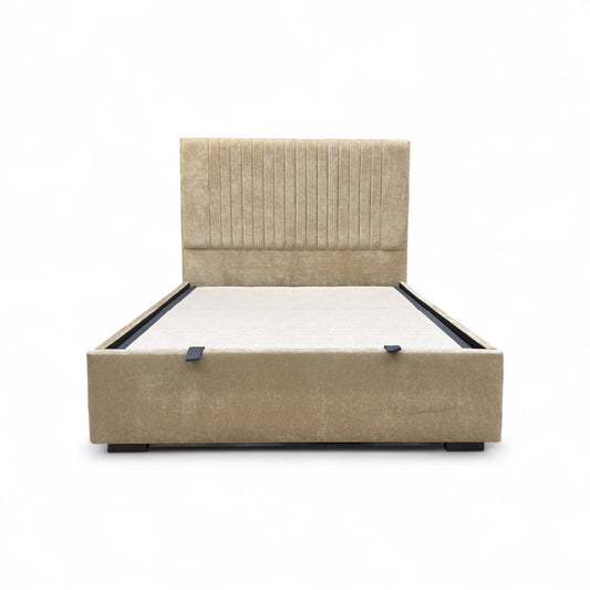 Beige upholstered bed frame on a white background