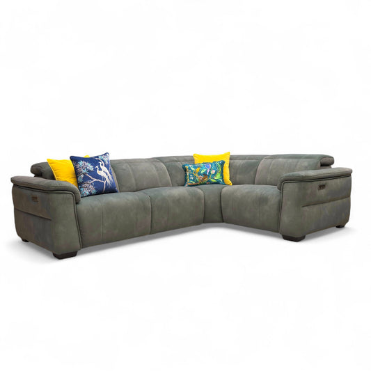 Full, front view of the Inca 'Dexter' Right-Hand Facing Corner Sofa upholstered in Moss Green velvet fabric, featuring double power recliners