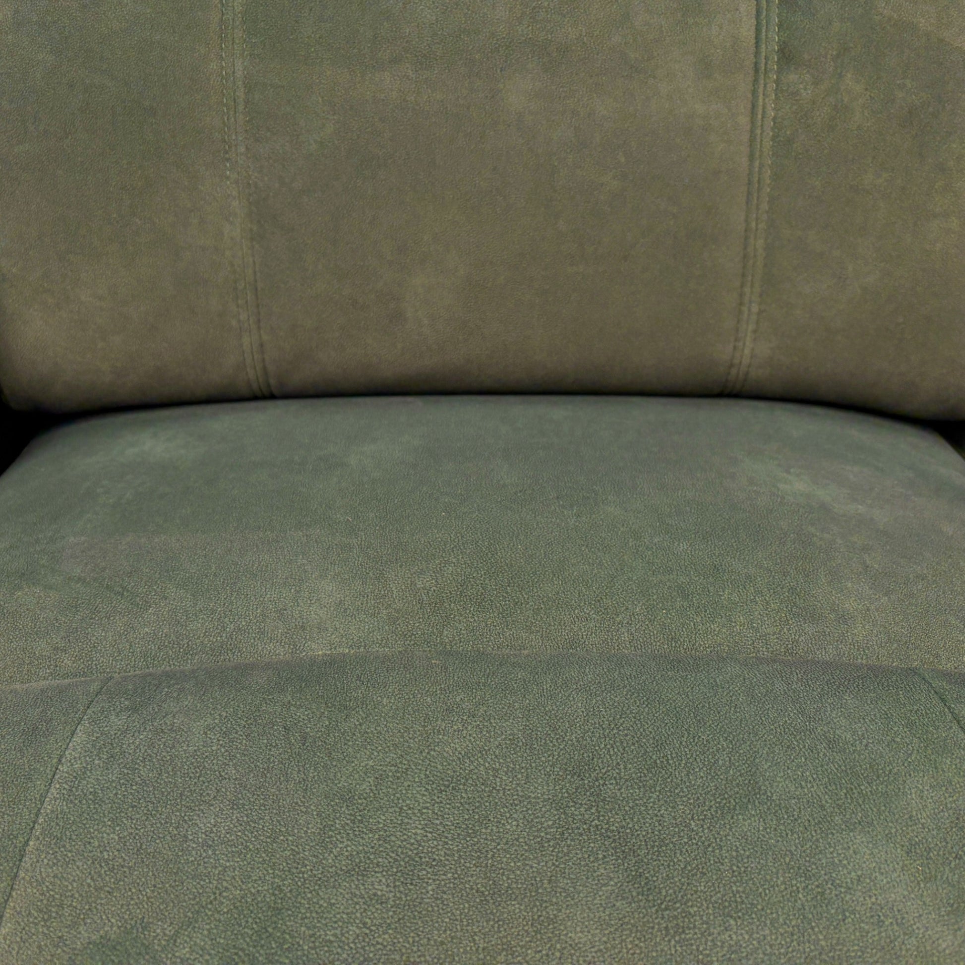 Close-up of the recliner control panel and integrated USB charging port located on the side of the sofa's armrest