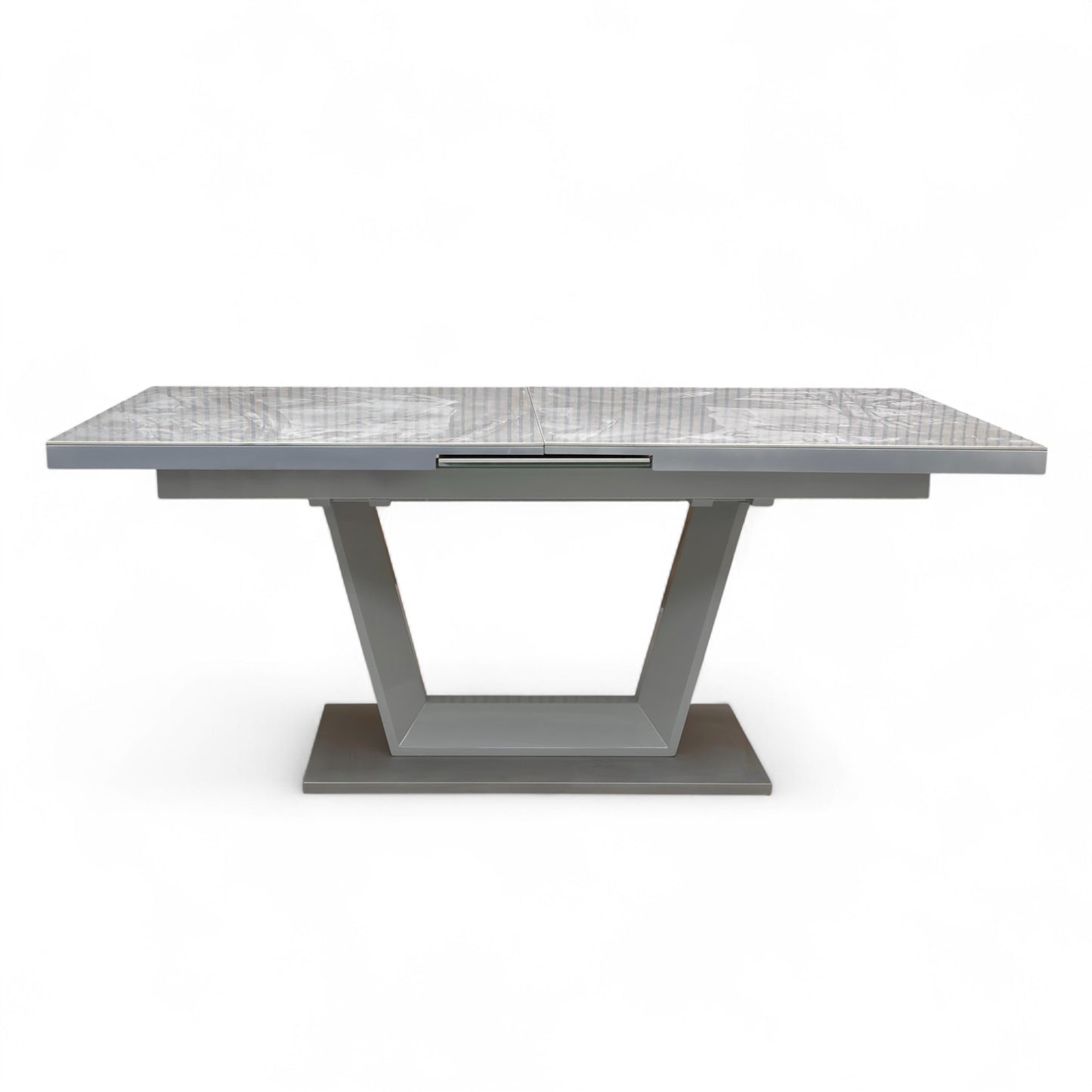 Close-up of the Grigio ceramic tabletop, showcasing the realistic gray and white veining of the marble effect.