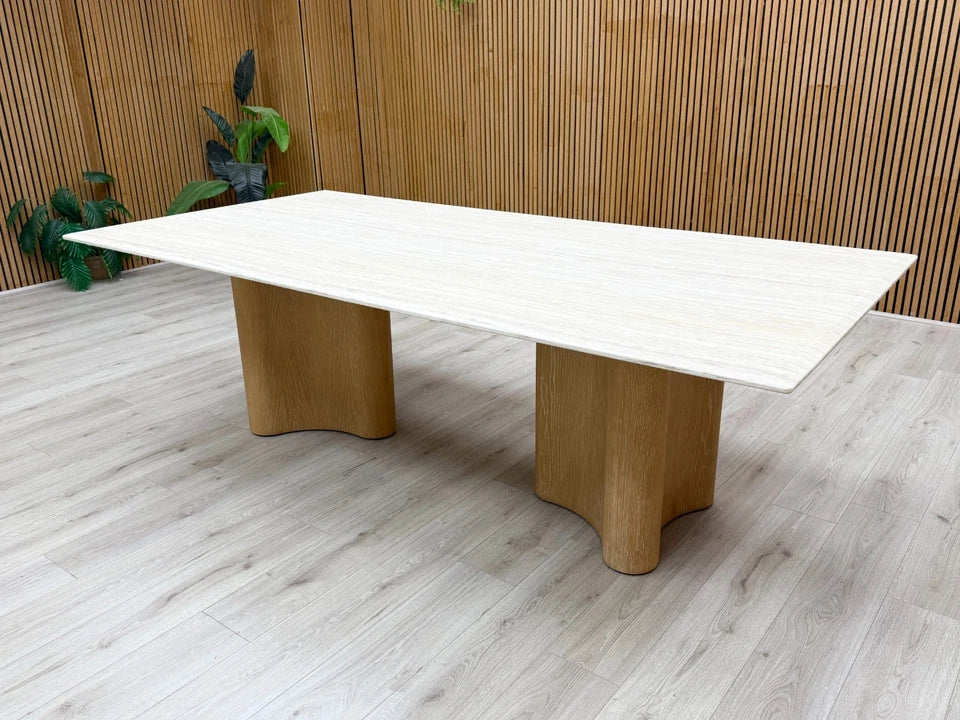 Low angle view showing the design and structure of the white-washed oak legs supporting the 240cm dining table.