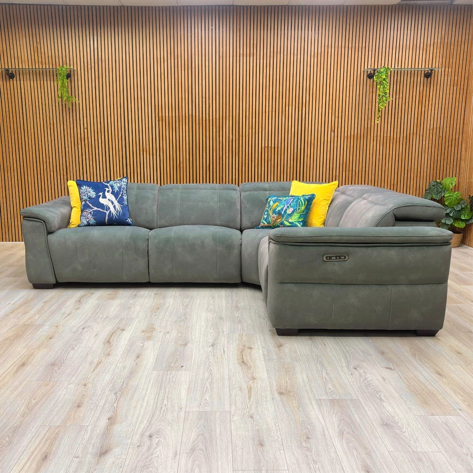 The Inca 'Dexter' sofa with the two outer power recliner seats fully extended and the power headrests raised for a comfortable, laid-back position