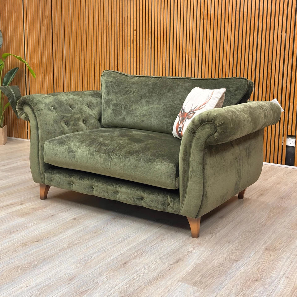 Boutique ‘Palace’ Snuggler Chair in Moss Fabric with a Classic Back is a luxurious addition to any living room