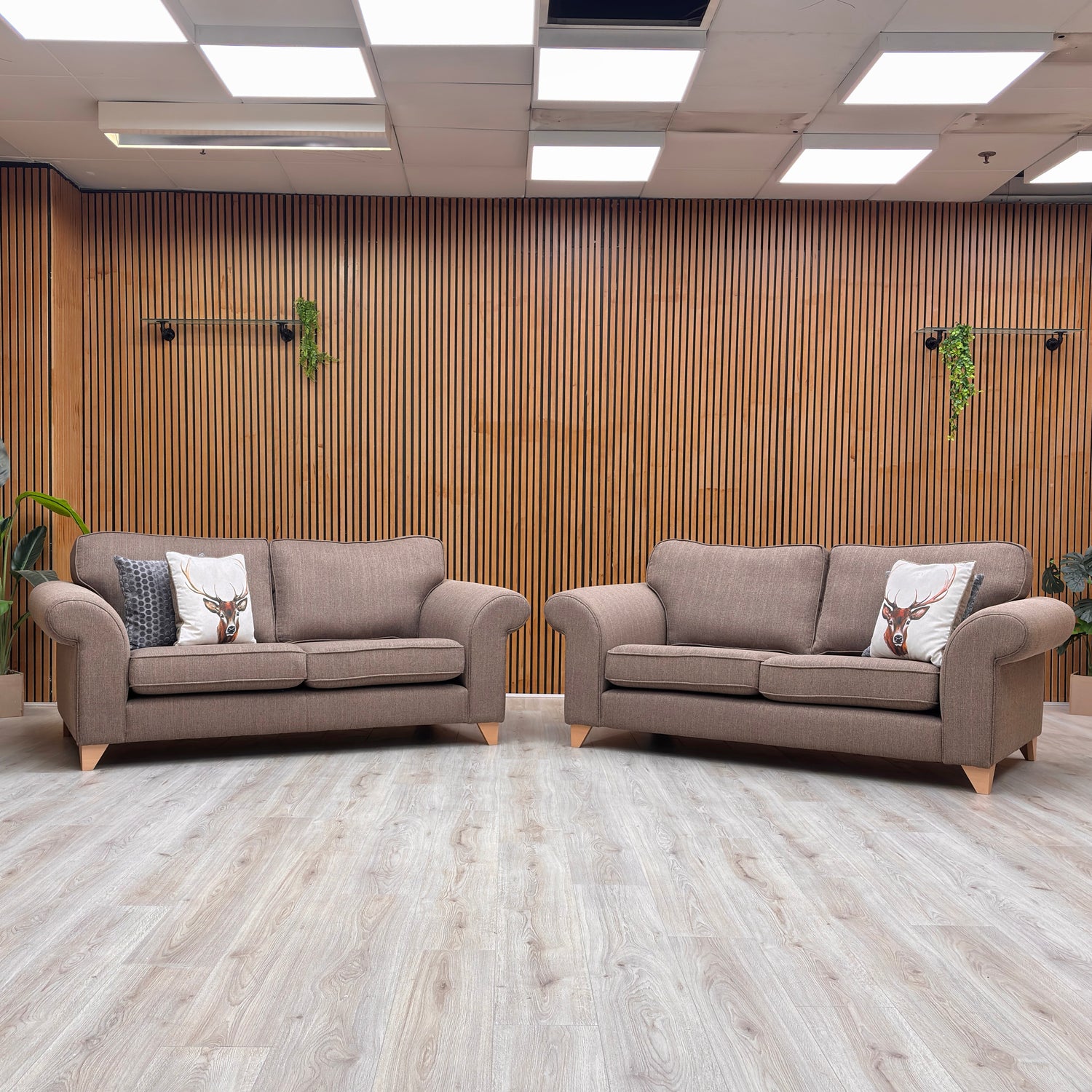 A curated collection of modern and classic two-seater sofas and loveseats in various fabrics and colours.