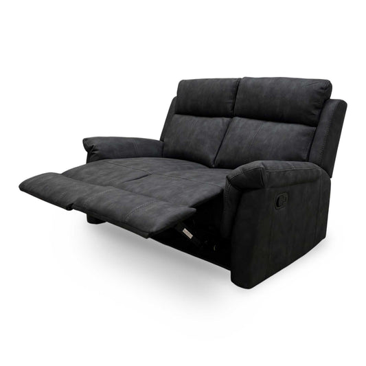 Full view of Oscar 2-seater manual recliner sofa in charcoal soft leather featuring a modern silhouette and plush cushioning.