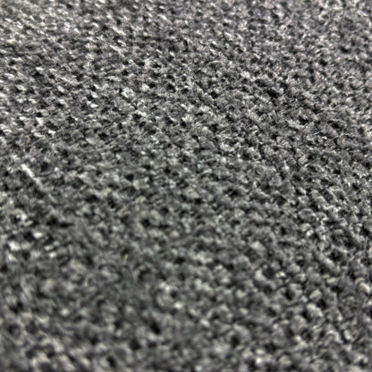 Close up view of the weave fabric texture and tailored stitching on the Costa sofa armrest.