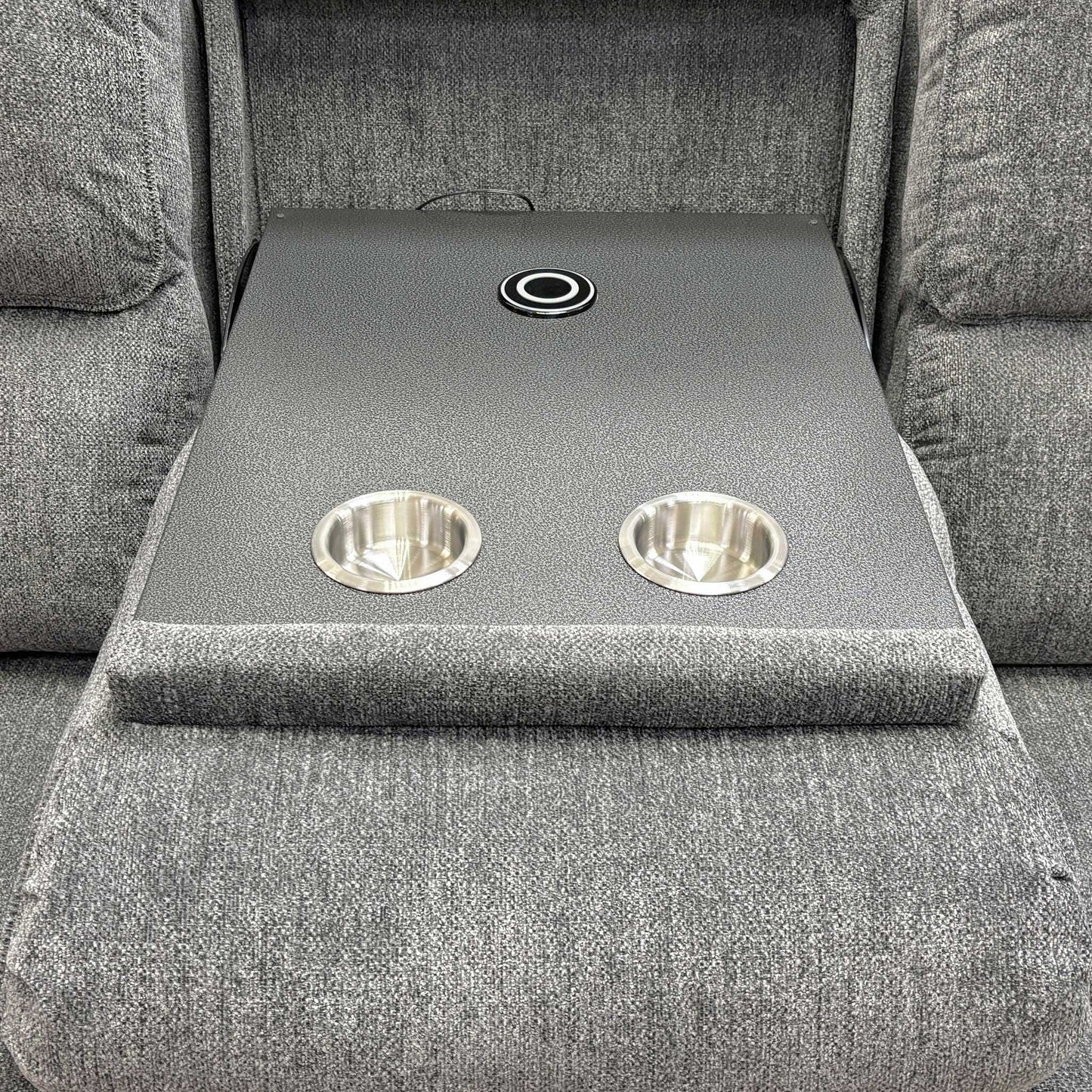 Close up shot of the Costa 3-seater sofa with cupholders in a bright, modern living room.