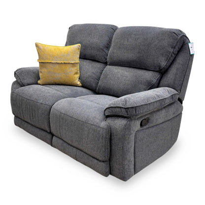 Side profile of the Costa manual recliner sofa in the upright position.