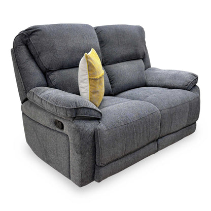 Side profile of the Costa manual recliner sofa in the upright position.