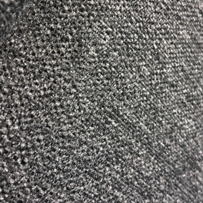 Close up view of the durable charcoal grey weave fabric and quality stitching on the Costa sofa.