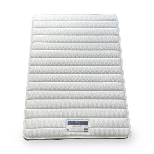 Full view  shot of the Silentnight Miracoil Memory mattress in double size, showing the quilted top surface.