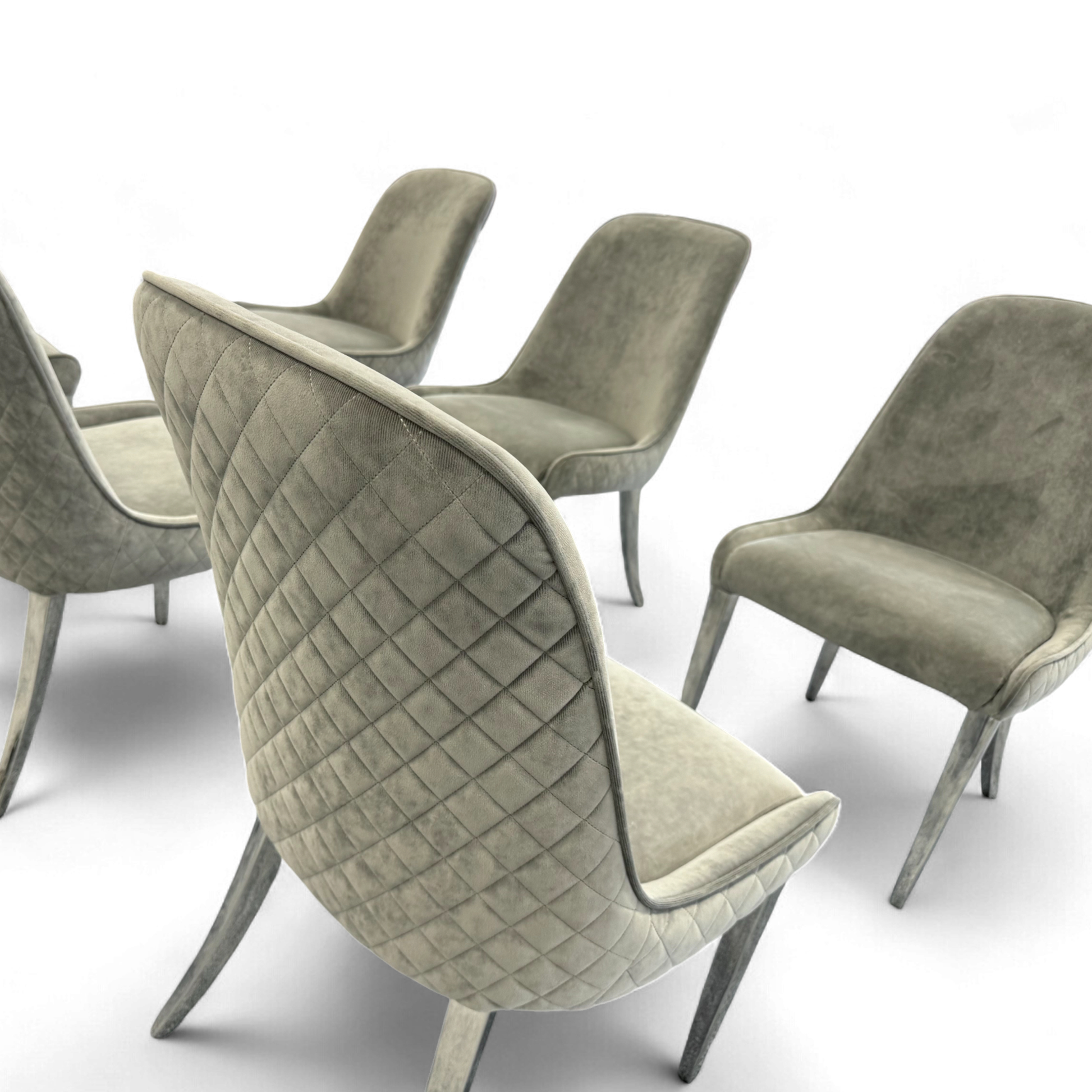 Close-up detail of the stone velvet upholstery on the back of the 'Gabana' chair, highlighting the plush texture and stitching.