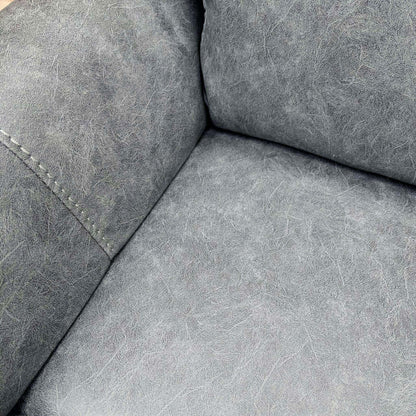 Close-up of the grey endurance fabric on the seat and arm of the Azzurri recliner sofa