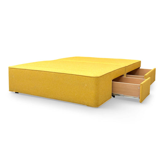 Front-angle view of the Sleepeezee Double divan base in vibrant mustard tweed upholstery with silver legs.