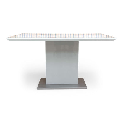 Detailed shot of the pedestal base and the brushed stainless steel plinth for a modern finish.