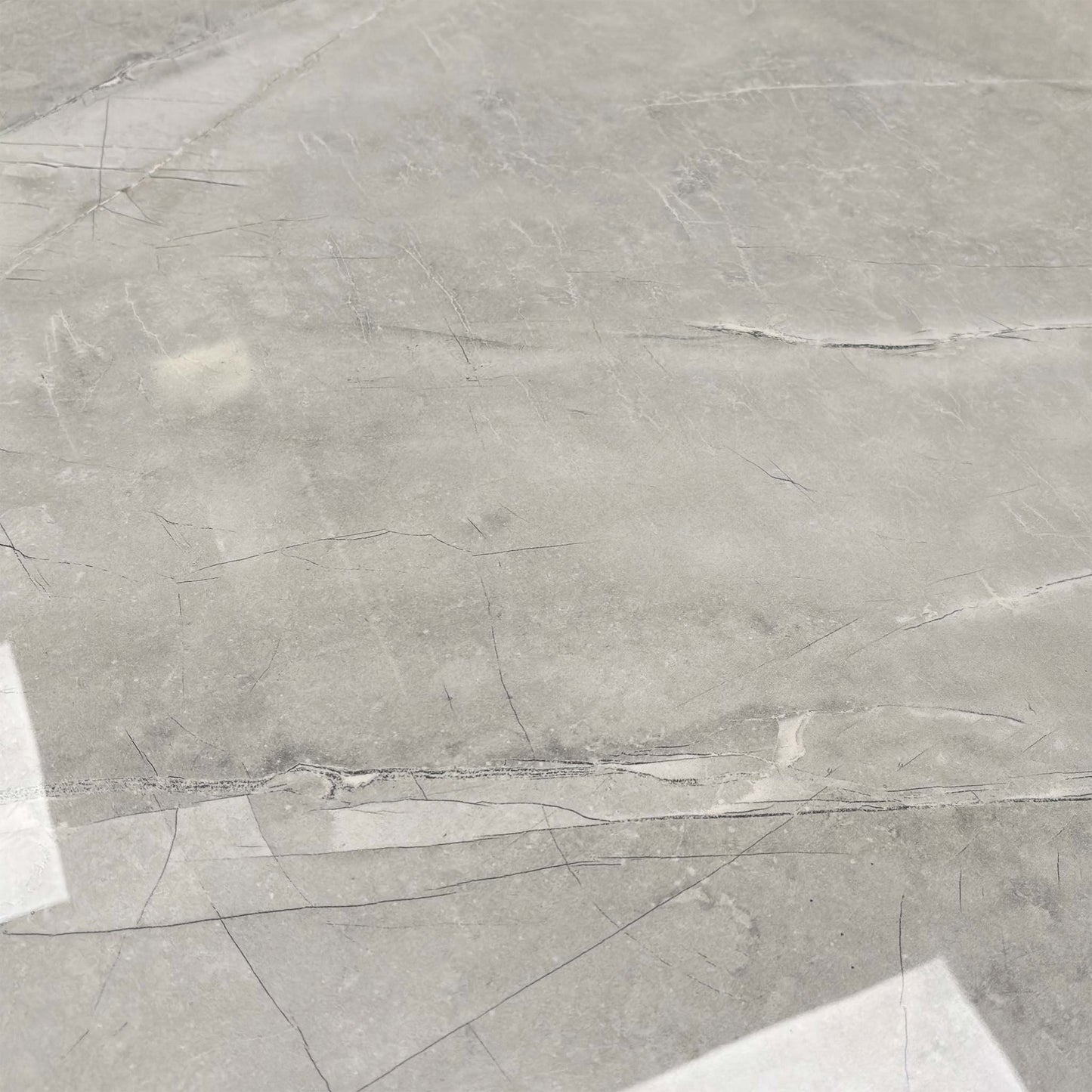 Close-up of the high-gloss ceramic finish, highlighting the realistic grey marble veining and durable texture.