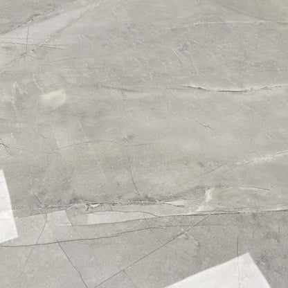 Close-up of the high-gloss ceramic finish, highlighting the realistic grey marble veining and durable texture.
