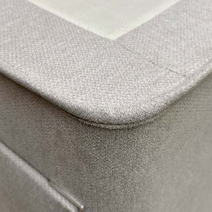 Side view of the divan base with one drawer pulled open, demonstrating the built-in storage space.