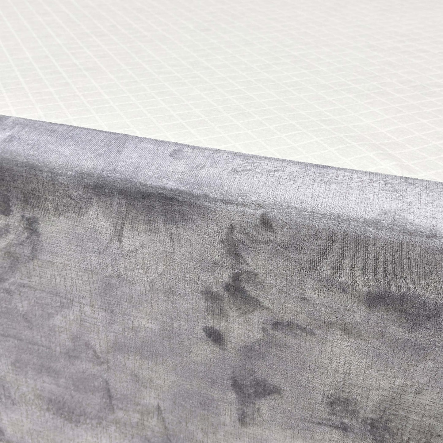 Close-up shot detailing the texture of the Lace Dolphin Velvet upholstery on the 'Sleep Story' bed base.