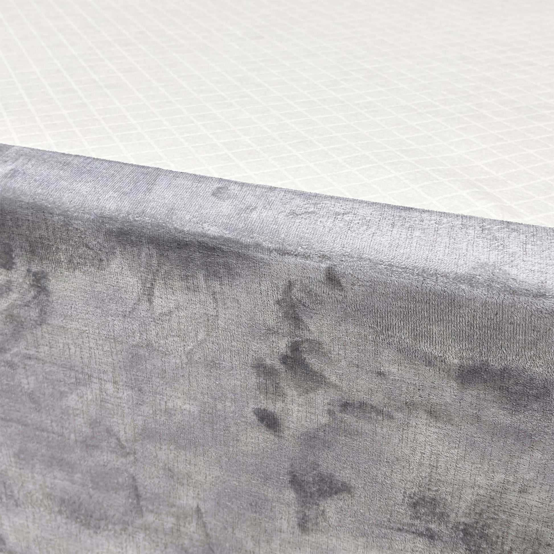 Close-up shot detailing the texture of the Lace Dolphin Velvet upholstery on the 'Sleep Story' bed base.