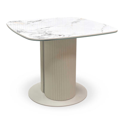Side profile of the Avorio lamp table, highlighting the balanced proportions of the 60cm diameter top and the sturdy pedestal support.