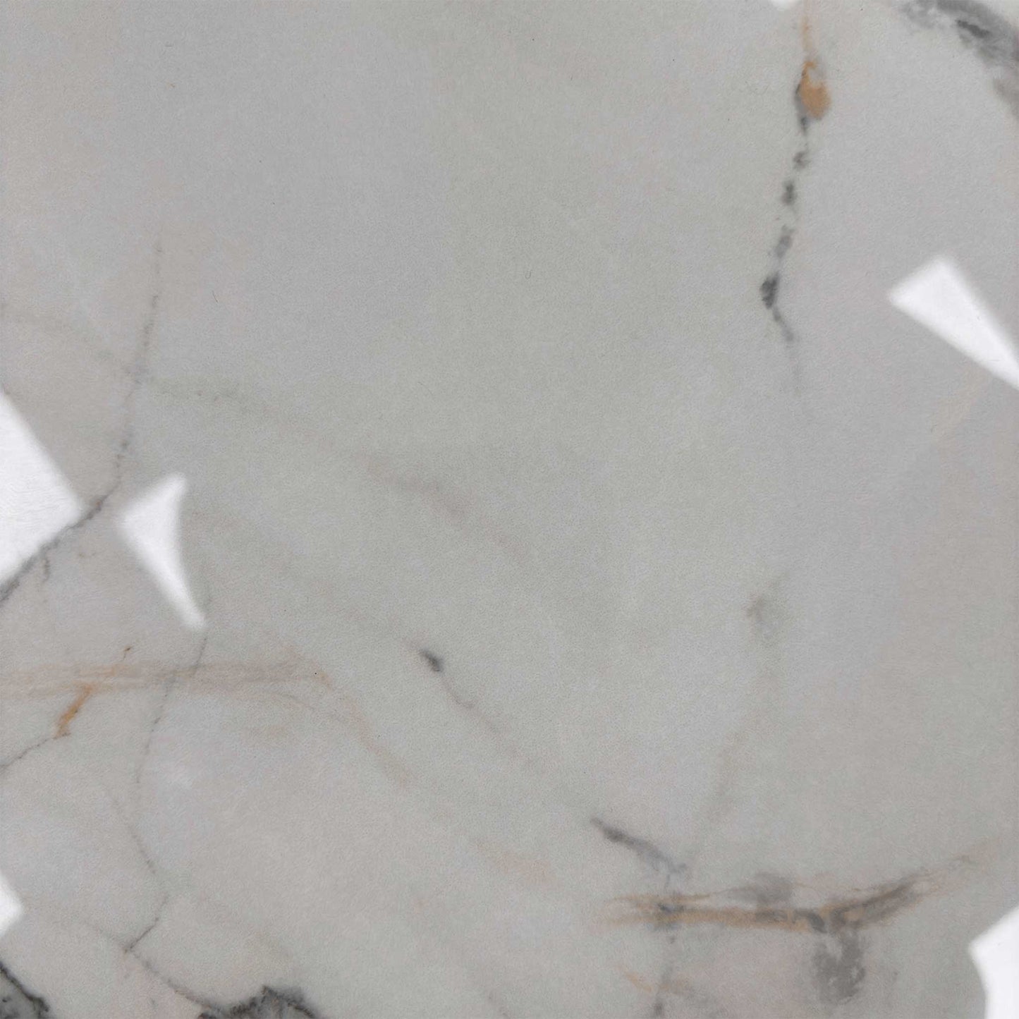 Close-up of the glossy marble-effect ceramic top, emphasizing the realistic veining and the smooth, reflective surface.