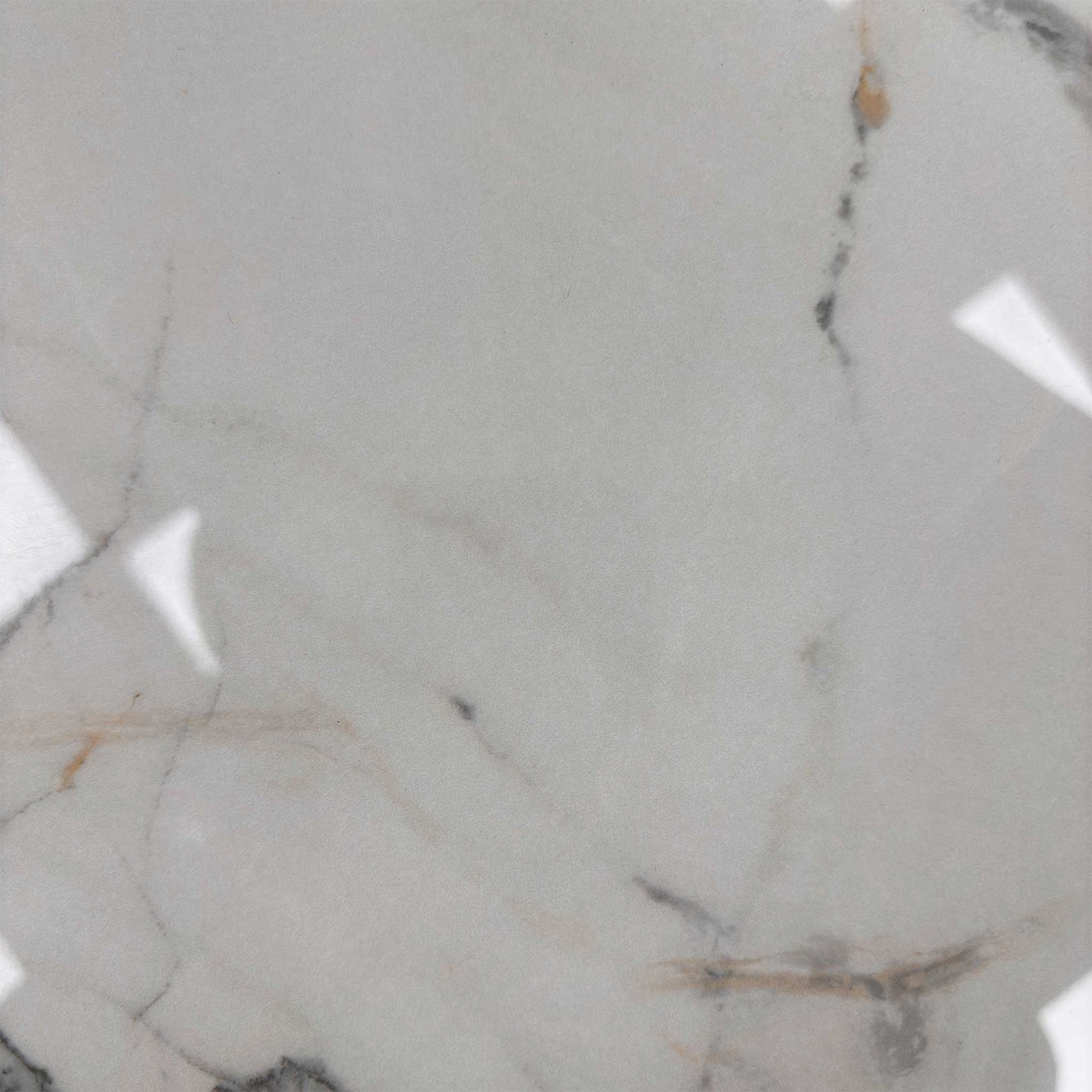 Close-up of the glossy marble-effect ceramic top, emphasizing the realistic veining and the smooth, reflective surface.