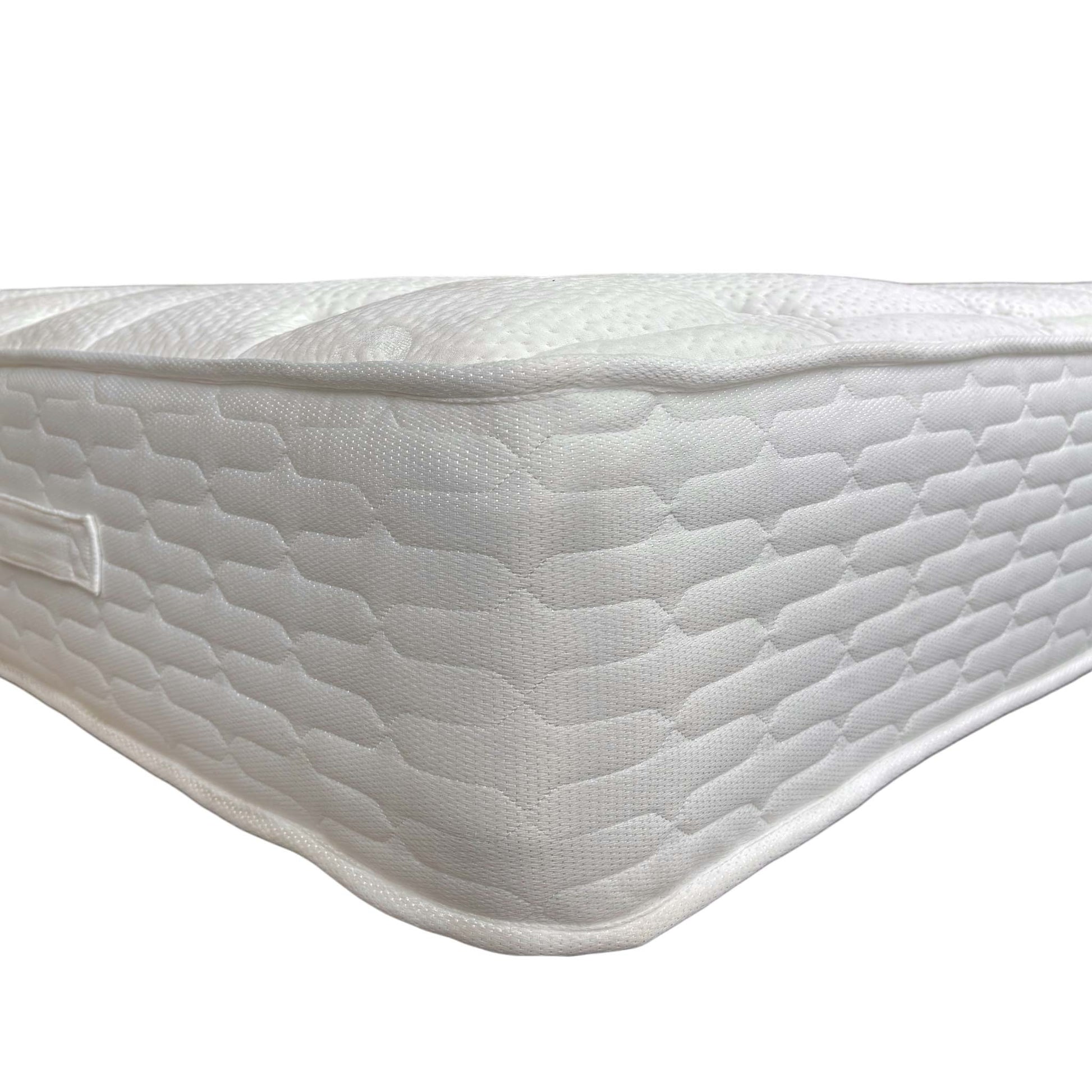 Angled view showing the full scale of the Super King size mattress, emphasizing its spacious sleeping surface.