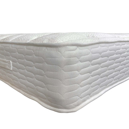 Angled view showing the full scale of the Super King size mattress, emphasizing its spacious sleeping surface.