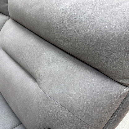 Close-up shot detailing the construction and stitching of the Nappa Grey fabric upholstery.