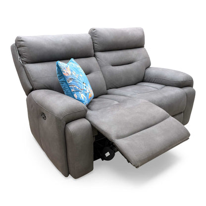 Full View studio view of the 'Cinemax' Nappa Grey Media 2 Seater Sofa, highlighting the central control panel/armrests.