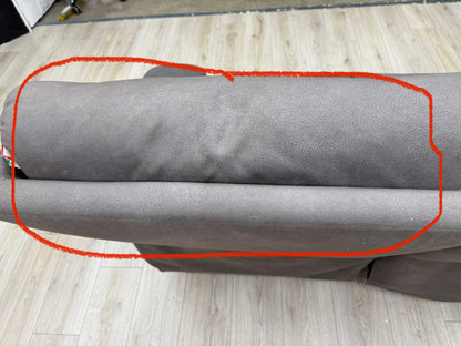 Detailed shot of discoloration on the upholstery and a small cosmetic imperfection on the headrest, neither of which affects comfort, usability, or functionality; please refer to the last photos for details.
