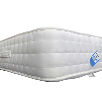 Edge shot of the mattress surface, emphasizing the quilted ortho-support pattern designed for a medium-firm sleeping experience.