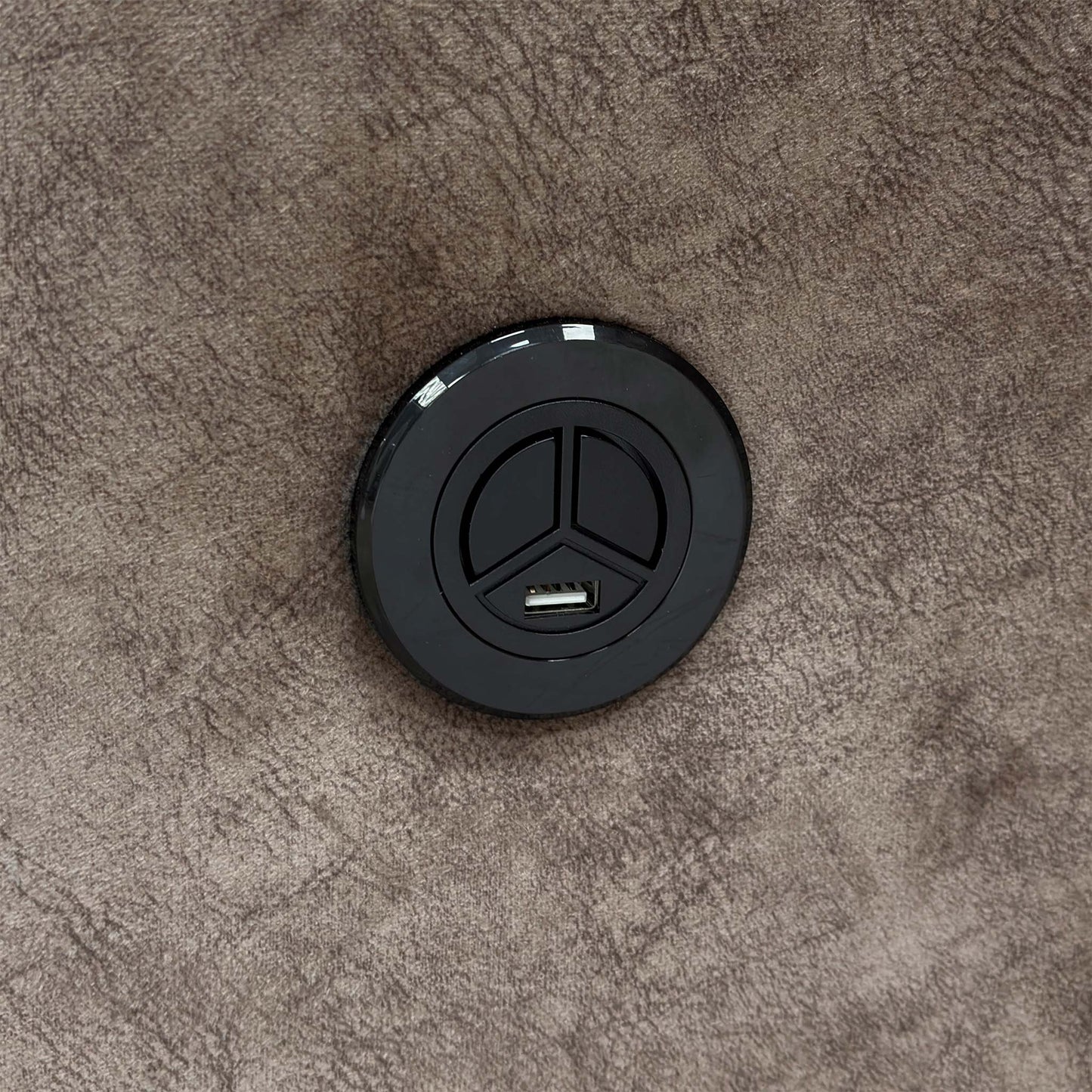 The Electric End Lift Ottoman storage mechanism fully open, revealing the spacious internal storage compartment.