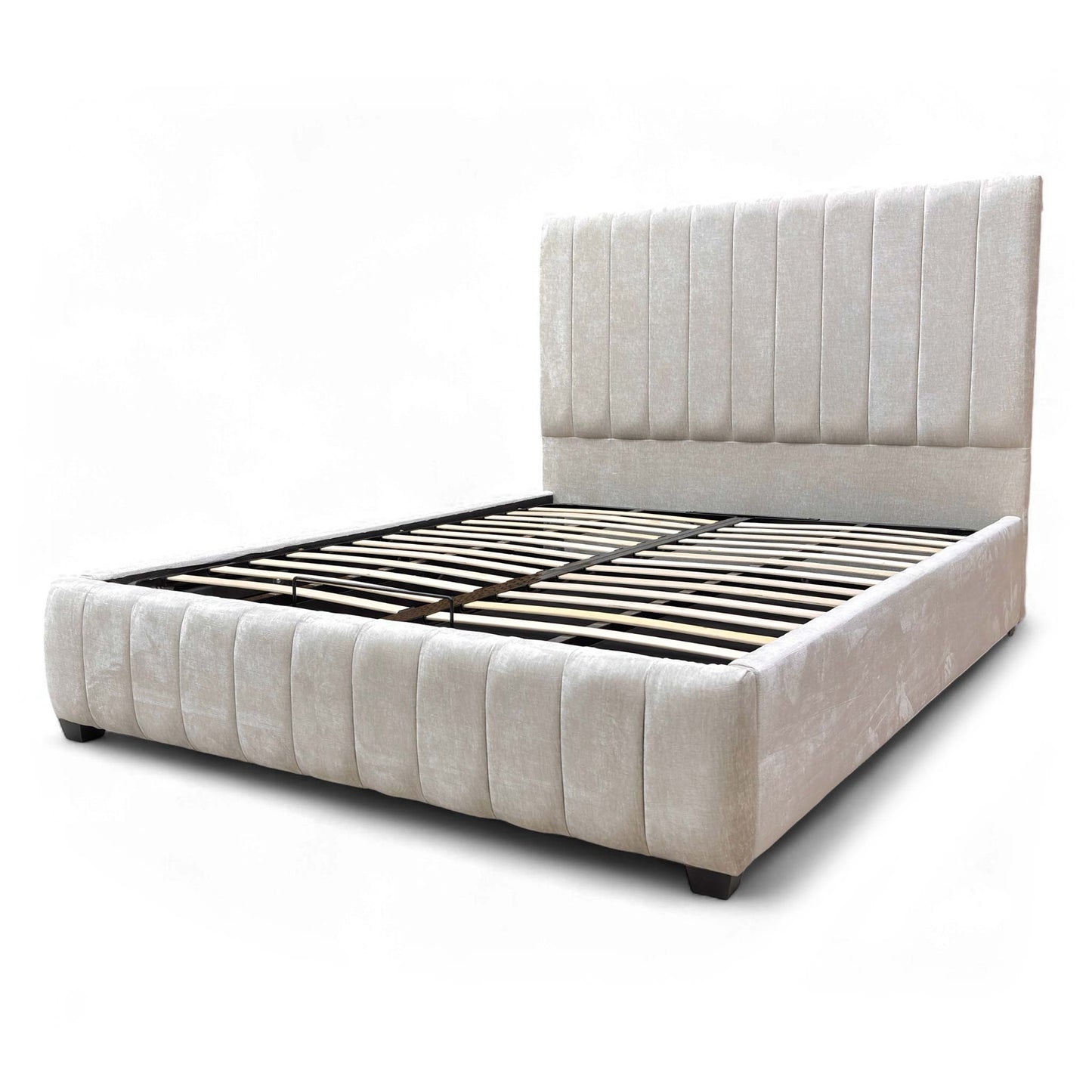 Angled view of the King size bed frame, emphasizing the chunky, low-profile upholstered base and mattress support.