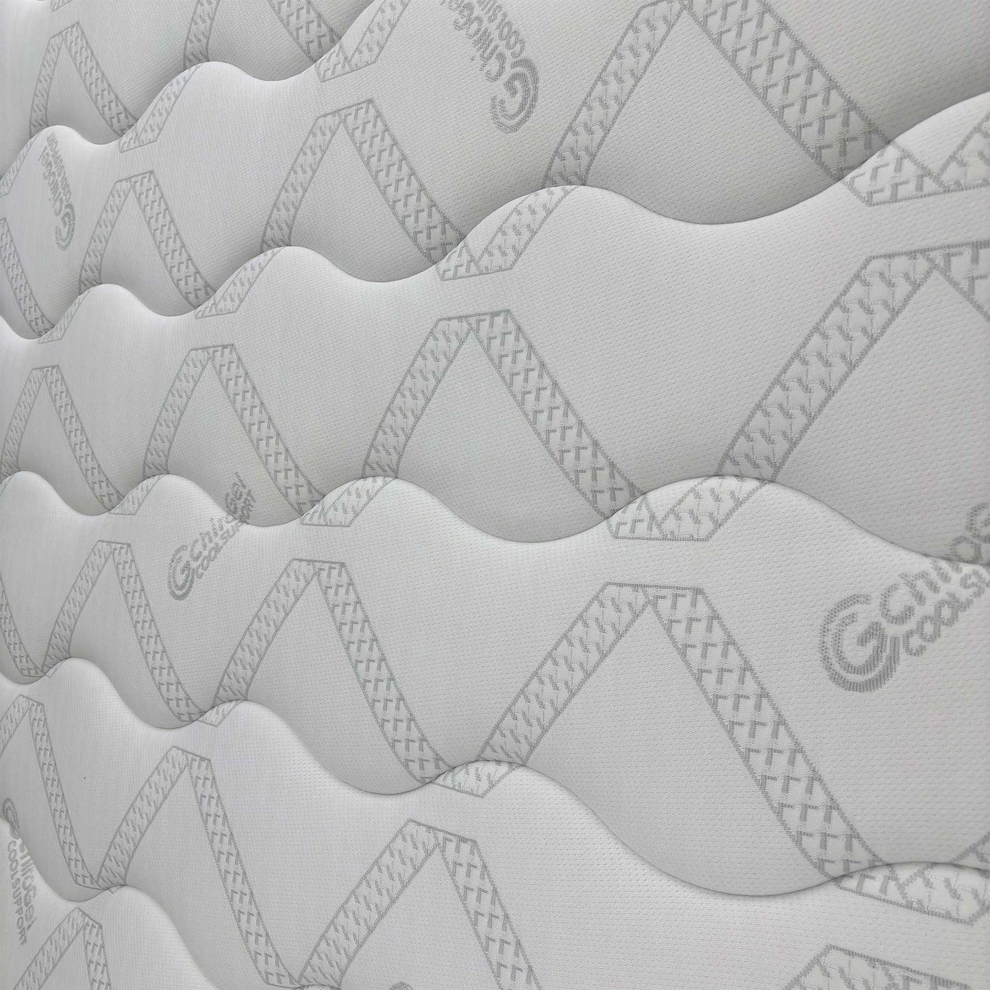 Close-up of the sleep surface texture, emphasizing the cooling gel-infused construction and soft-touch fabric for a restful night.