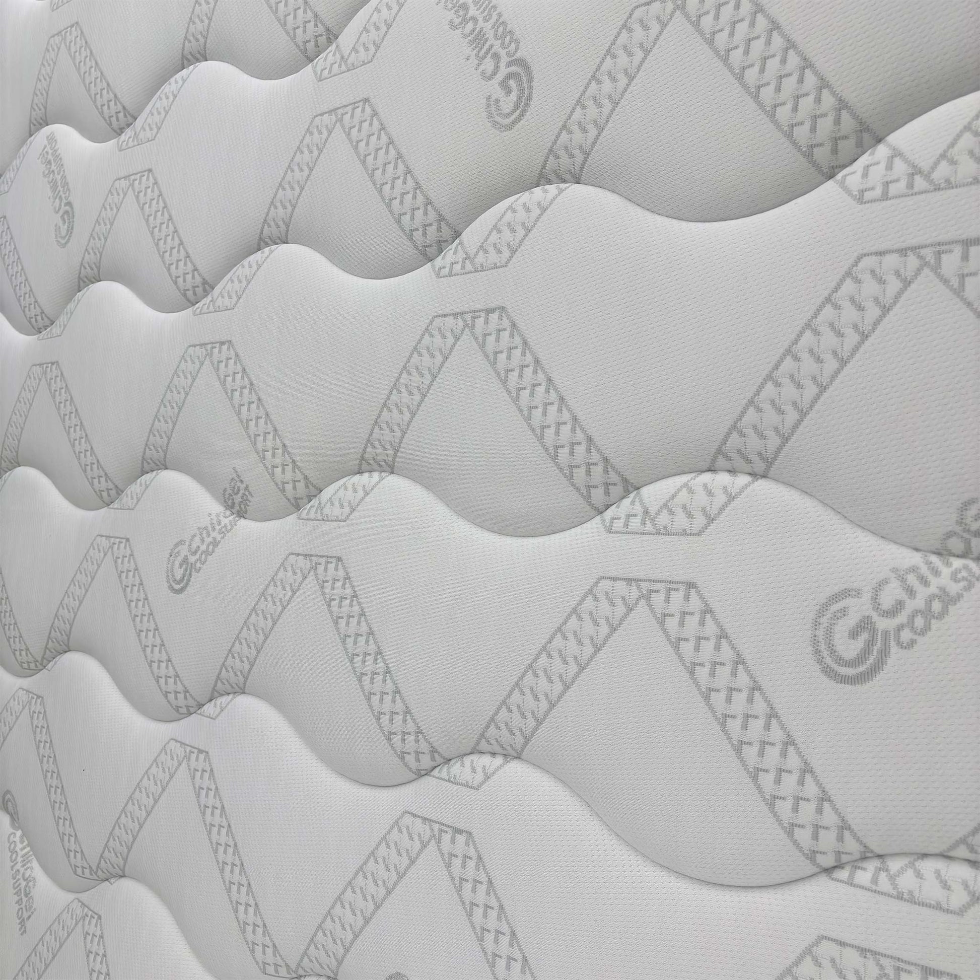 Close-up of the sleep surface texture, emphasizing the cooling gel-infused construction and soft-touch fabric for a restful night.