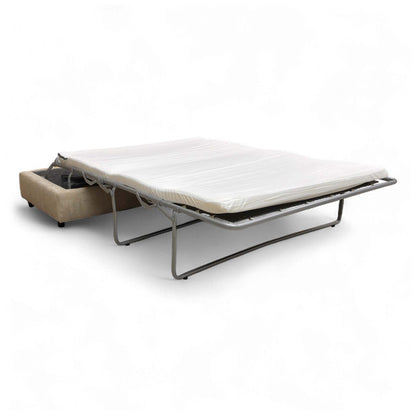 The 'Esprit' Large Footstool partially open, revealing the folded foam mattress and pull-out mechanism.