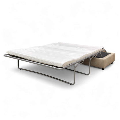 Side view of the Esprit Large Footstool, emphasizing its low-profile height.