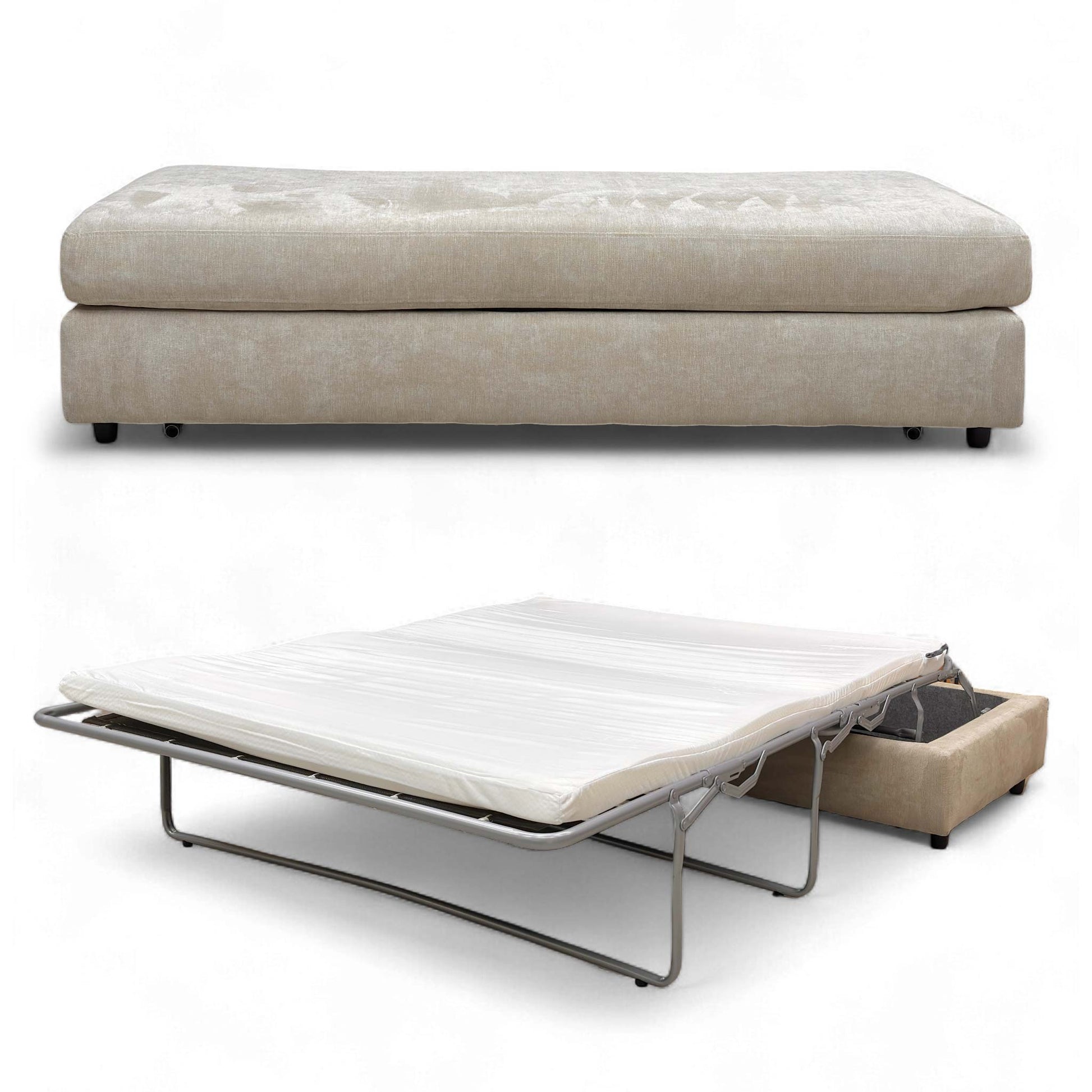 The footstool partially converted, showing the mattress starting to pull out.