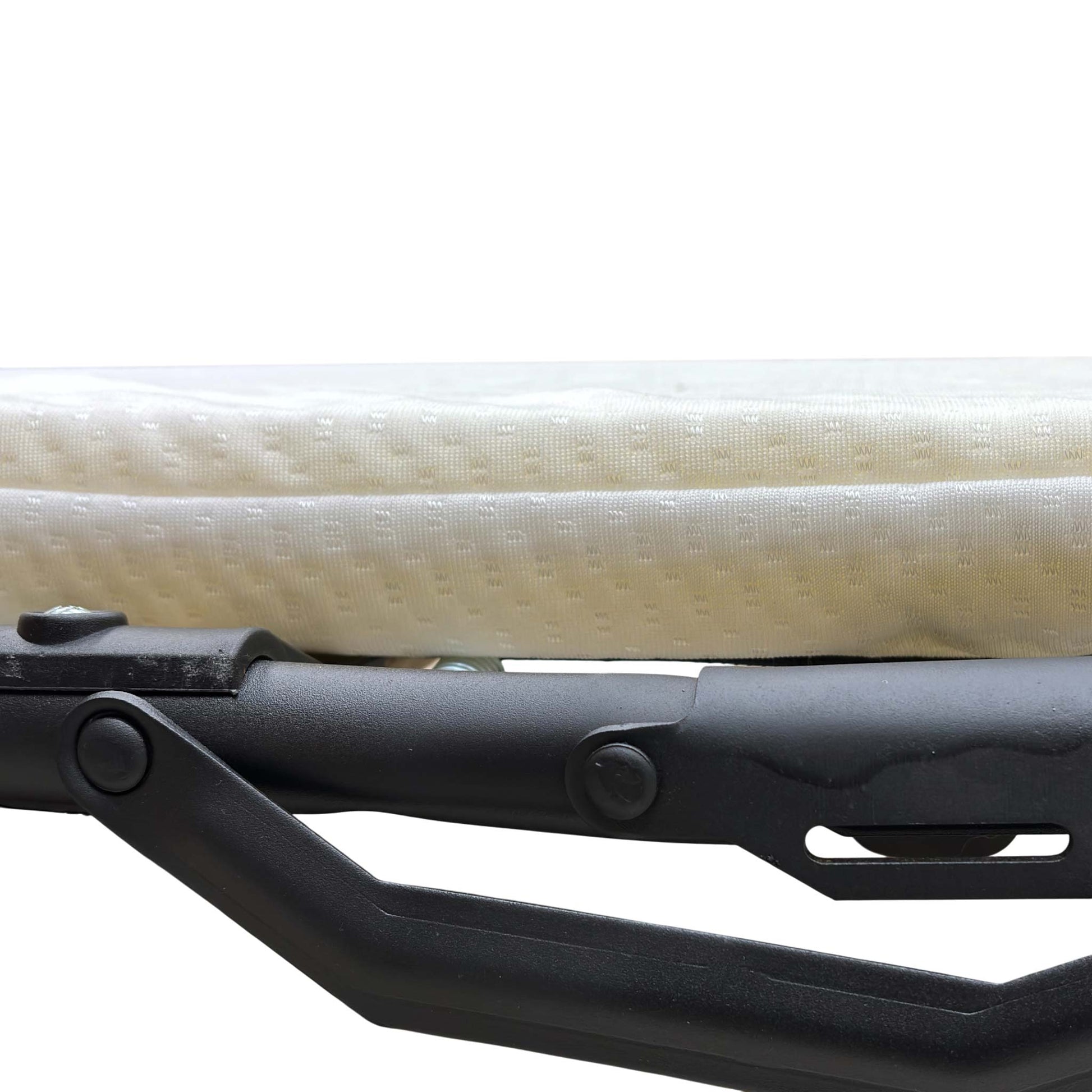 View of the pull-out sofa bed mattress before it is fully laid flat.