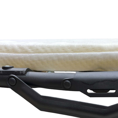 View of the pull-out sofa bed mattress before it is fully laid flat.