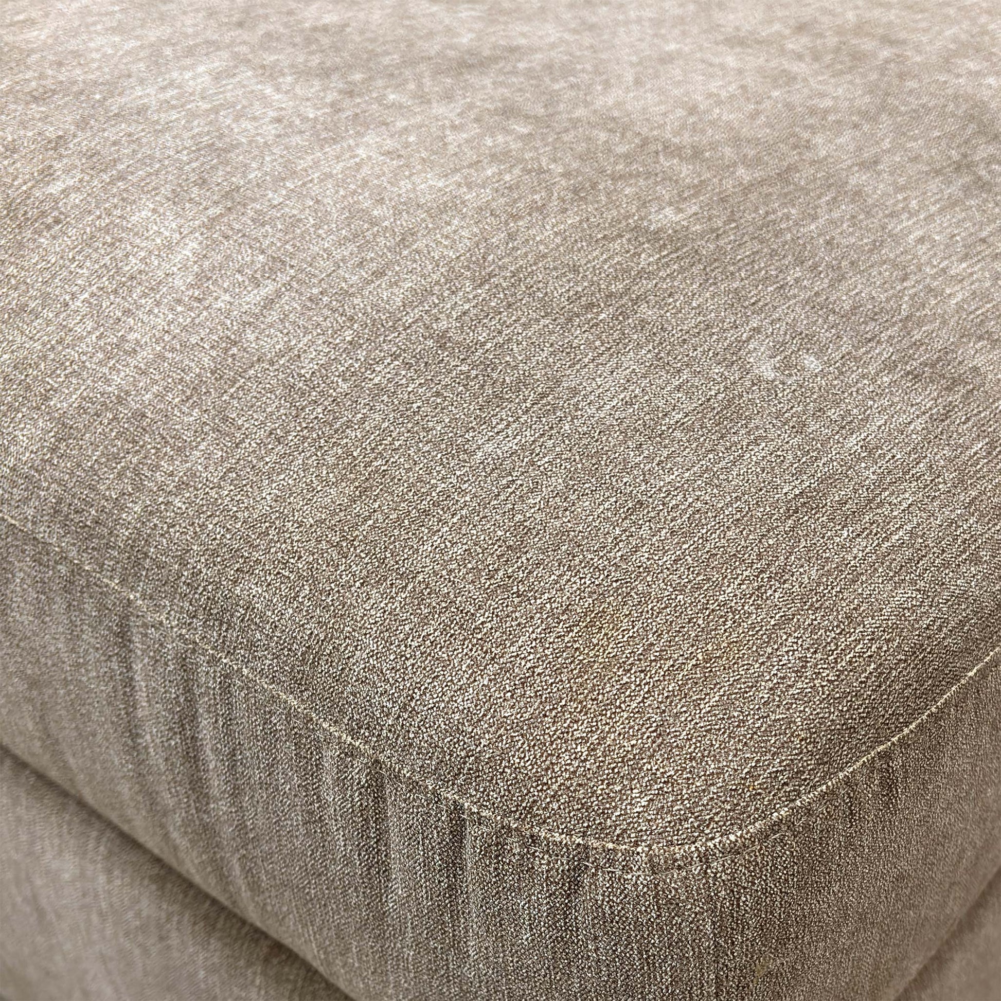 Close-up of the Mocha fabric upholstery texture.