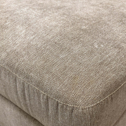 Close-up of the Mocha fabric upholstery texture.