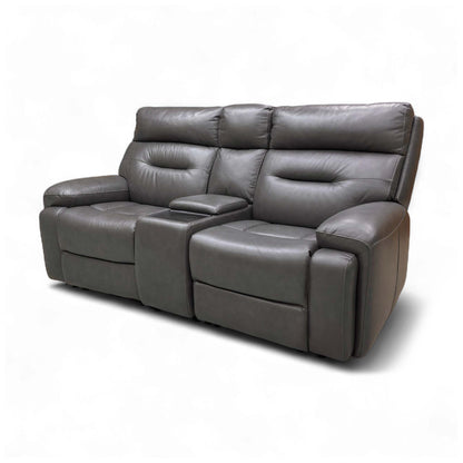 A view of the sofa from a different angle, emphasizing the contrast piping or stitching detail.