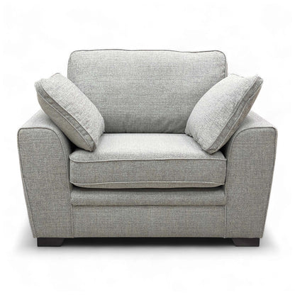 Full frontal shot of the armchair, emphasizing the seat and back cushion.