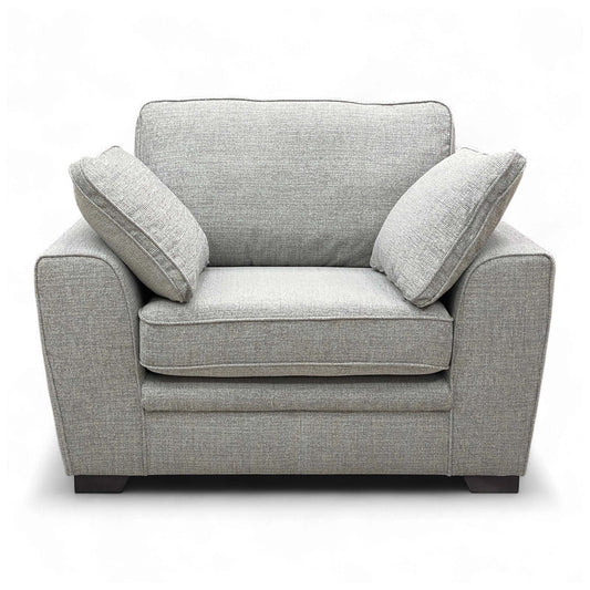Full frontal shot of the armchair, emphasizing the seat and back cushion.